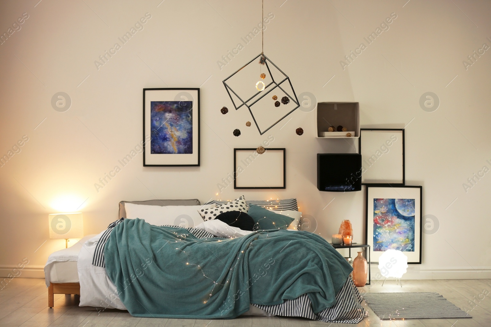 Photo of Stylish room interior with comfortable bed and decor