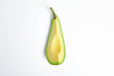 Photo of Slice of avocado on white background