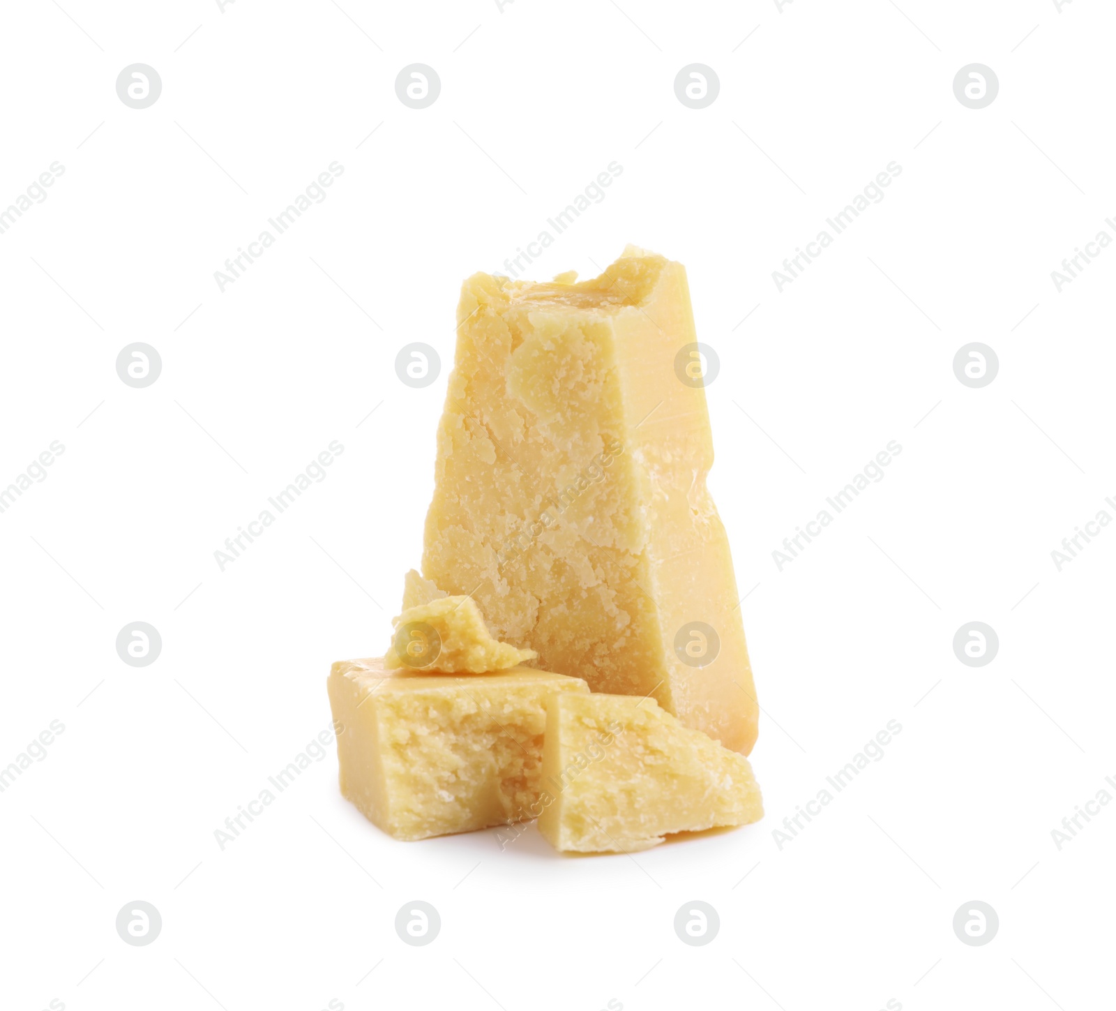 Photo of Pieces of delicious parmesan cheese on white background