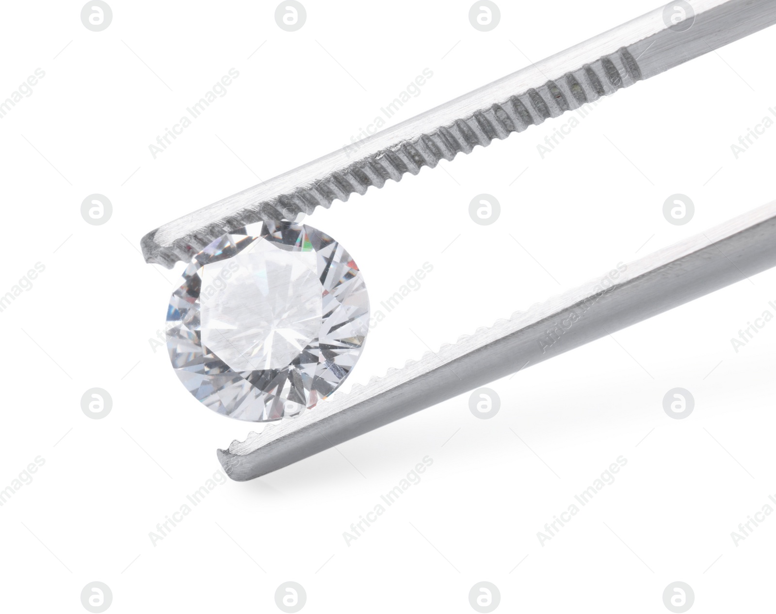 Photo of Tweezers with beautiful shiny diamond isolated on white