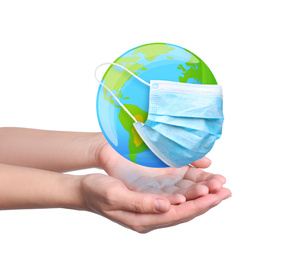 Woman holding Earth with medical mask on white background, closeup. Concept of coronavirus outbreak