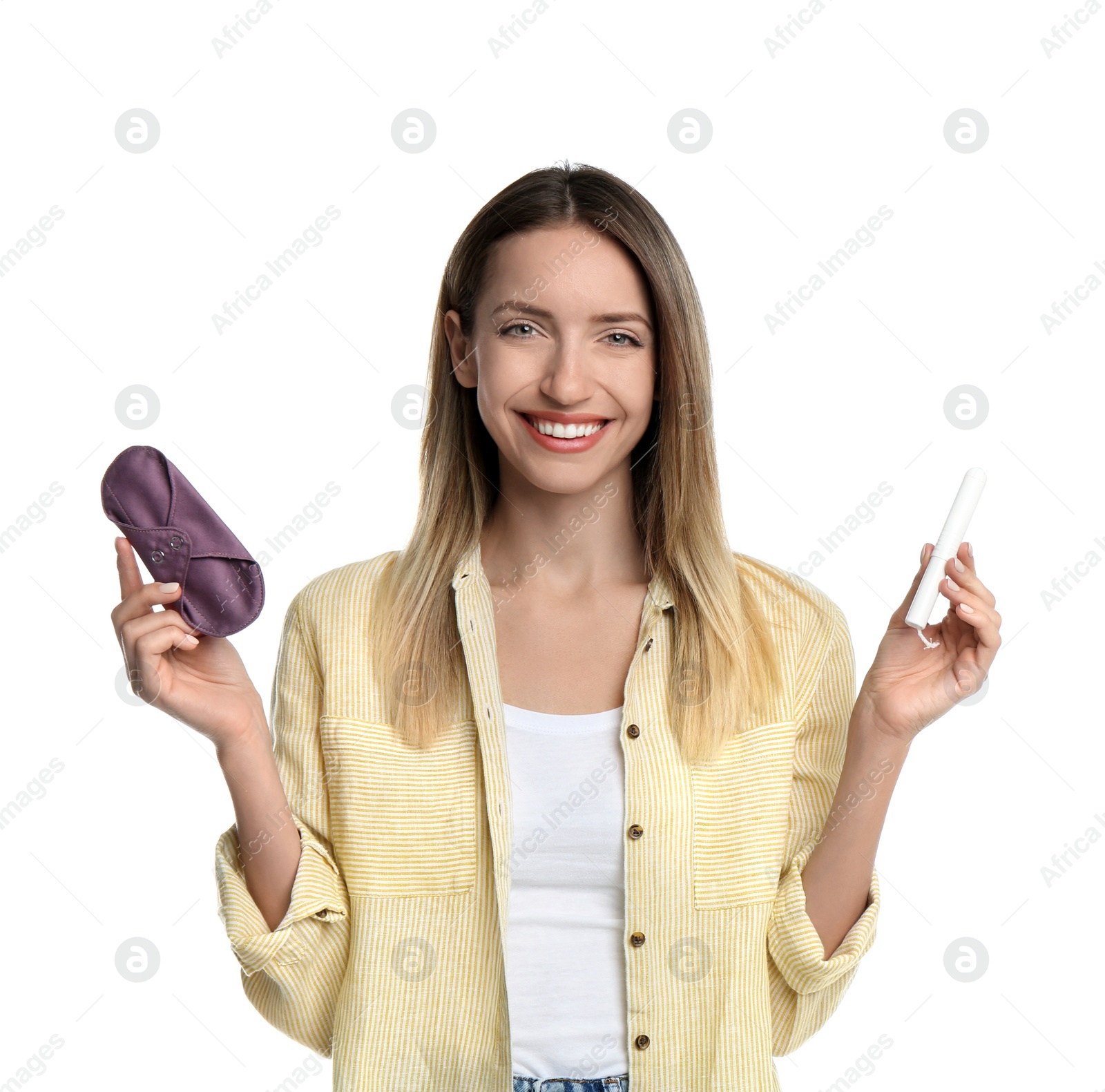 Photo of Happy young woman with tampon and reusable menstrual pad on white background