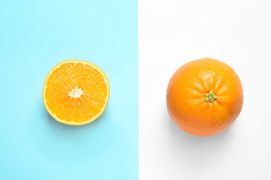 Flat lay composition with ripe oranges on color background