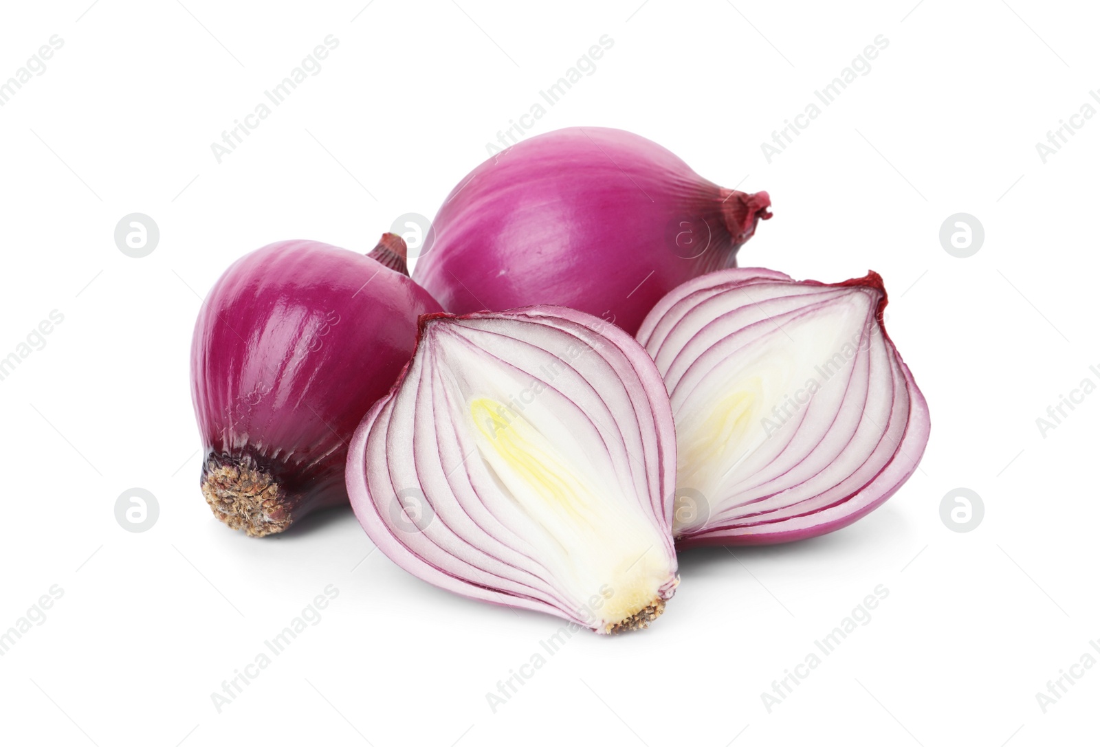 Photo of Fresh cut and whole red onion bulbs isolated on white