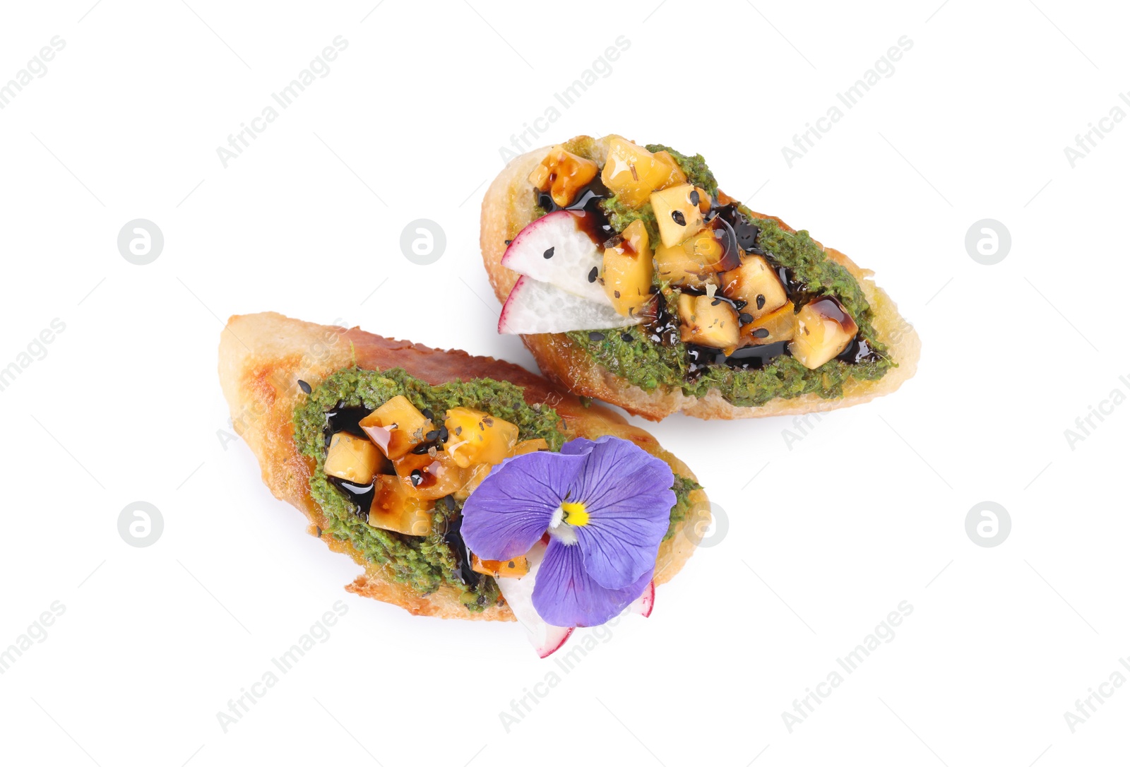 Photo of Delicious bruschettas with pesto sauce, tomatoes and balsamic vinegar isolated on white, top view