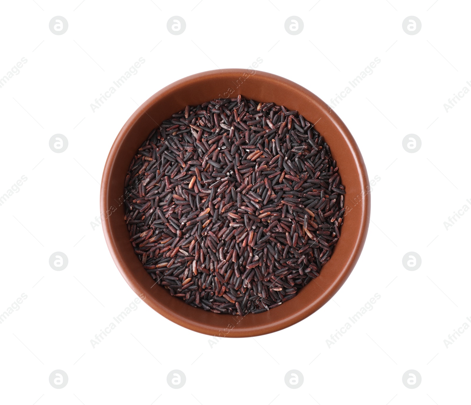 Photo of Brown rice in bowl isolated on white, top view
