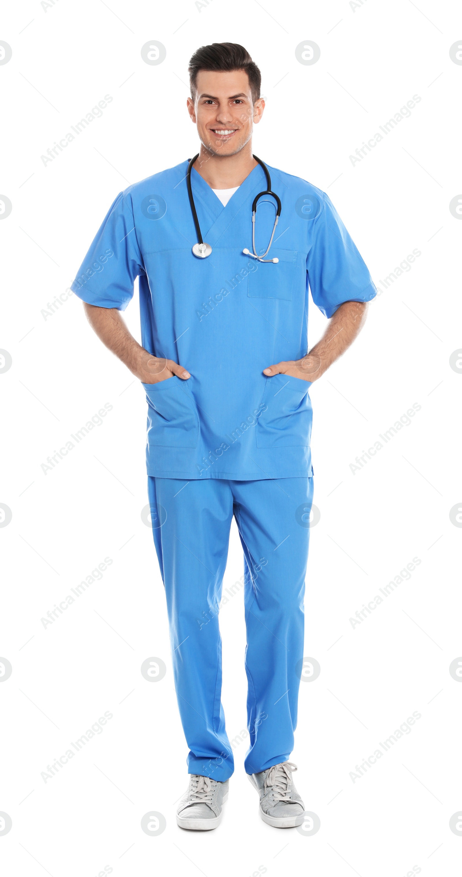 Photo of Full length portrait of medical doctor with stethoscope isolated on white