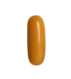 Photo of One light brown pill on white background. Medicinal treatment
