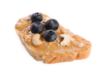Toast with tasty nut butter, blueberries and cashews isolated on white