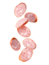 Image of Set of flying cut fresh sausage on white background