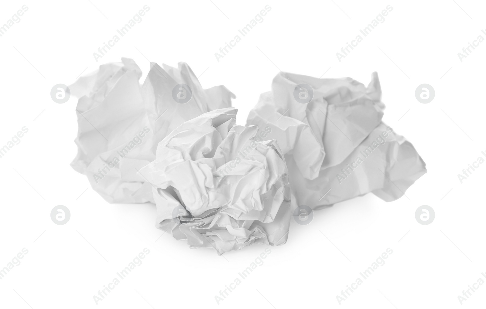 Photo of Crumpled sheets of paper on white background