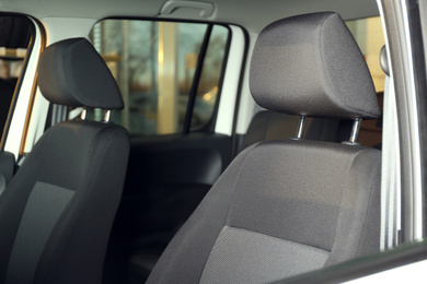 Photo of Modern car interior with comfortable grey seats