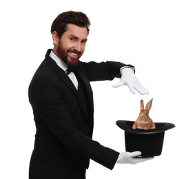 Image of Magician showing trick with top hat and rabbit on white background