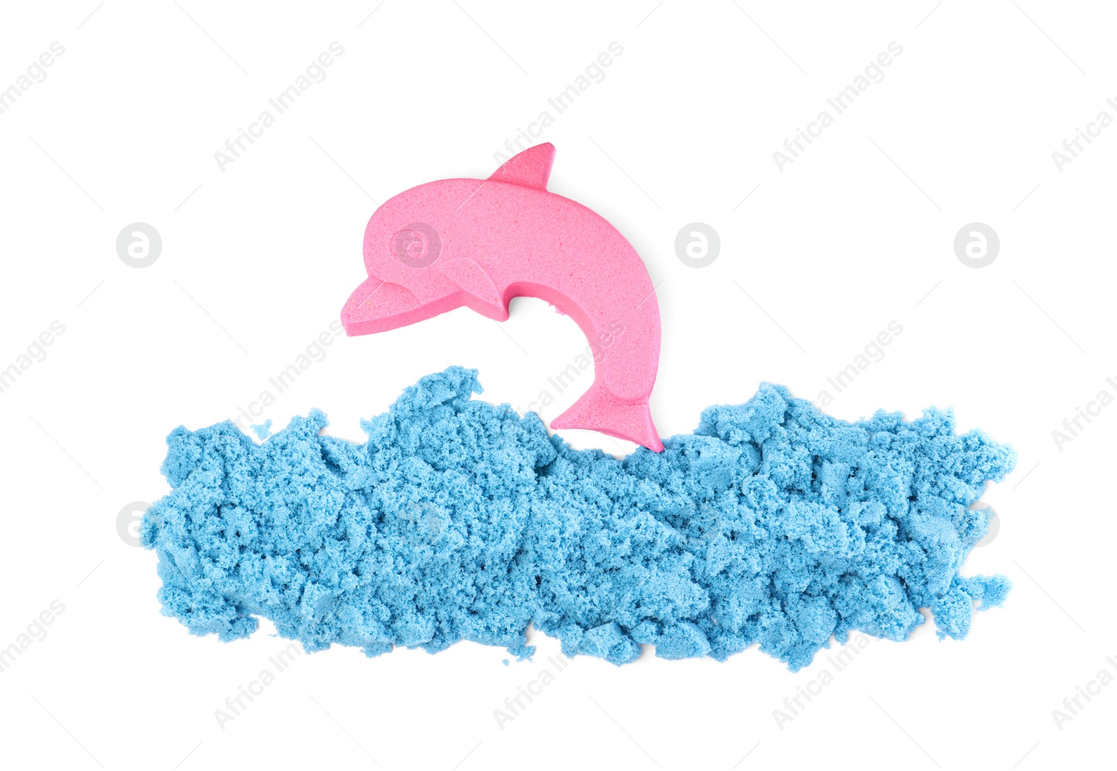 Photo of Dolphin and sea made of kinetic sand on white background, top view