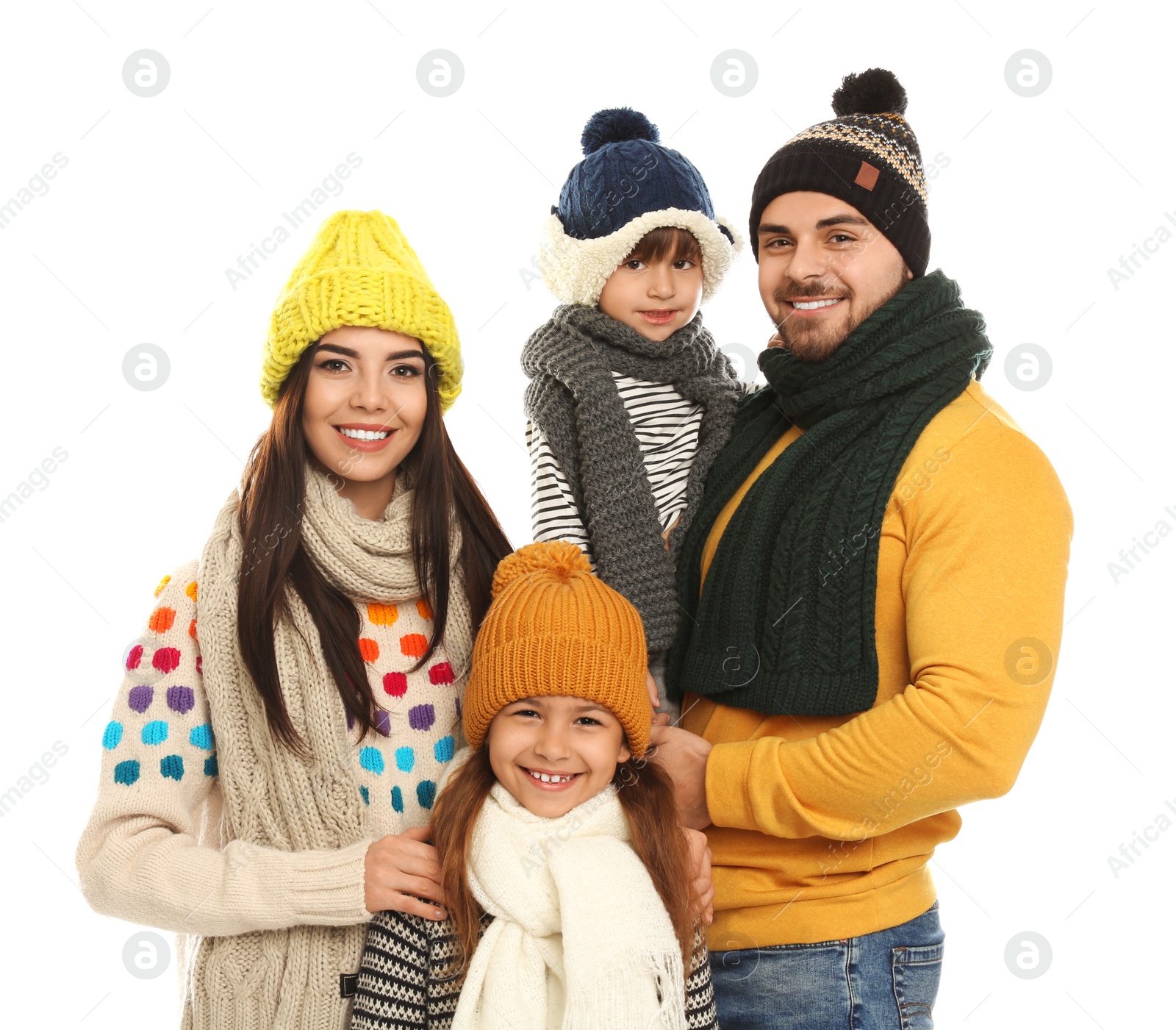 Photo of Happy family in warm clothes on white background. Winter vacation