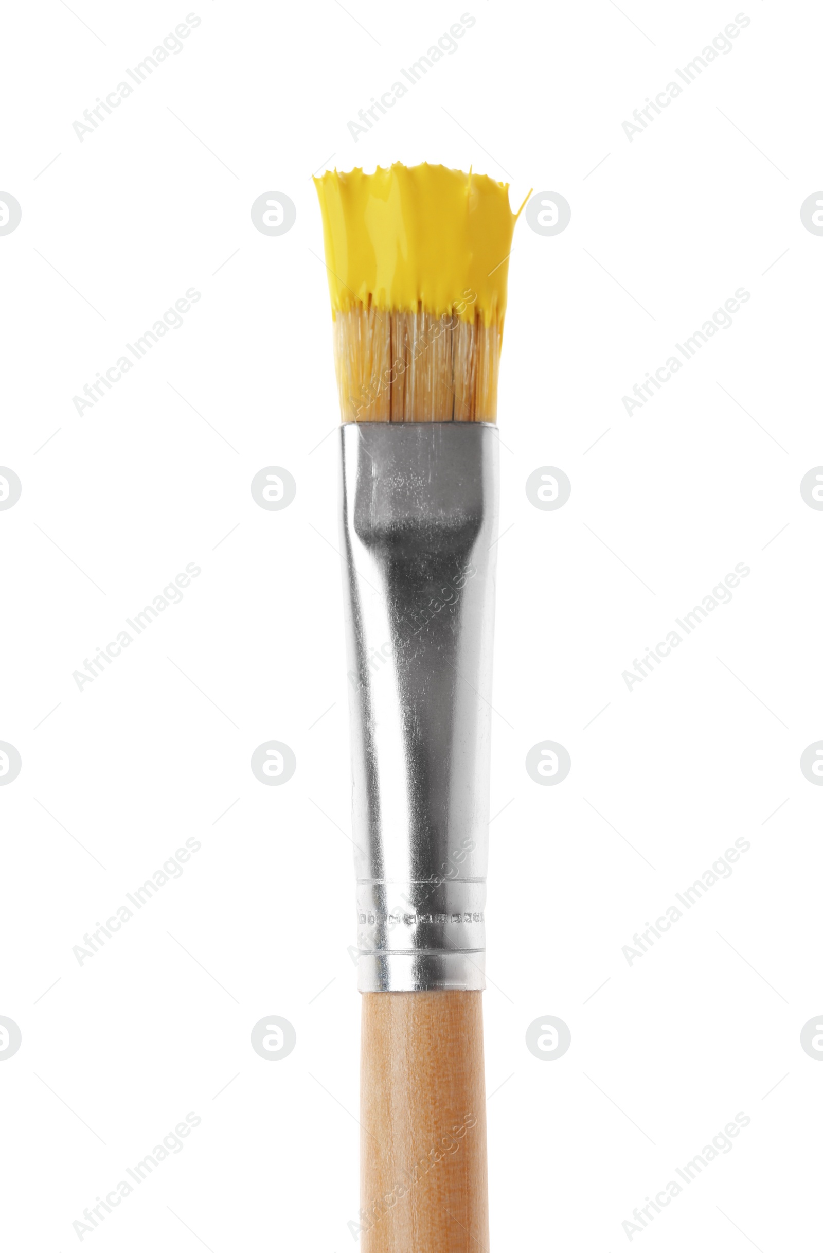 Photo of Brush with yellow paint on white background