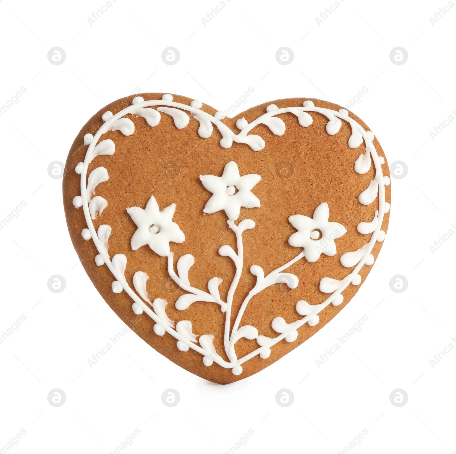 Photo of Gingerbread heart decorated with icing isolated on white