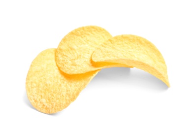 Tasty crispy potato chips on white background