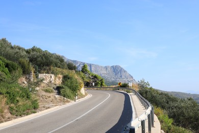 Beautiful view of road and mountain on sunny day