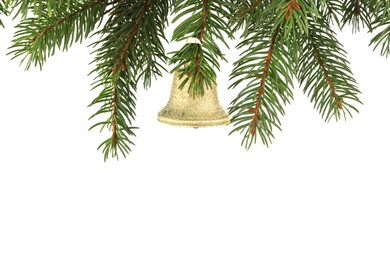 Photo of Christmas bell hanging on fir tree branch against white background