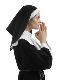 Photo of Nun with clasped hands praying to God on white background