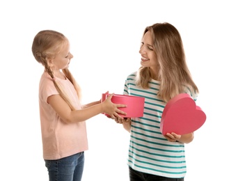 Little daughter congratulating her mom on white background. Happy Mother's Day