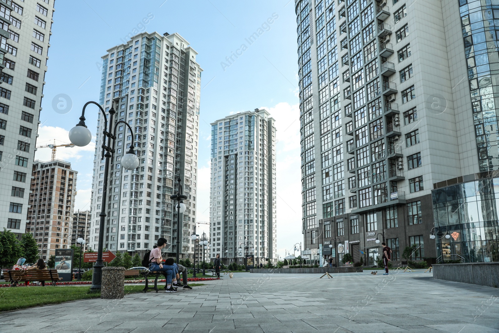 Photo of KYIV, UKRAINE - MAY 21, 2019: Beautiful view of modern housing estate in Pecherskyi district on sunny day