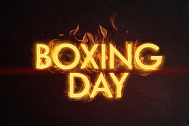 Image of Flaming text Boxing Day on dark background