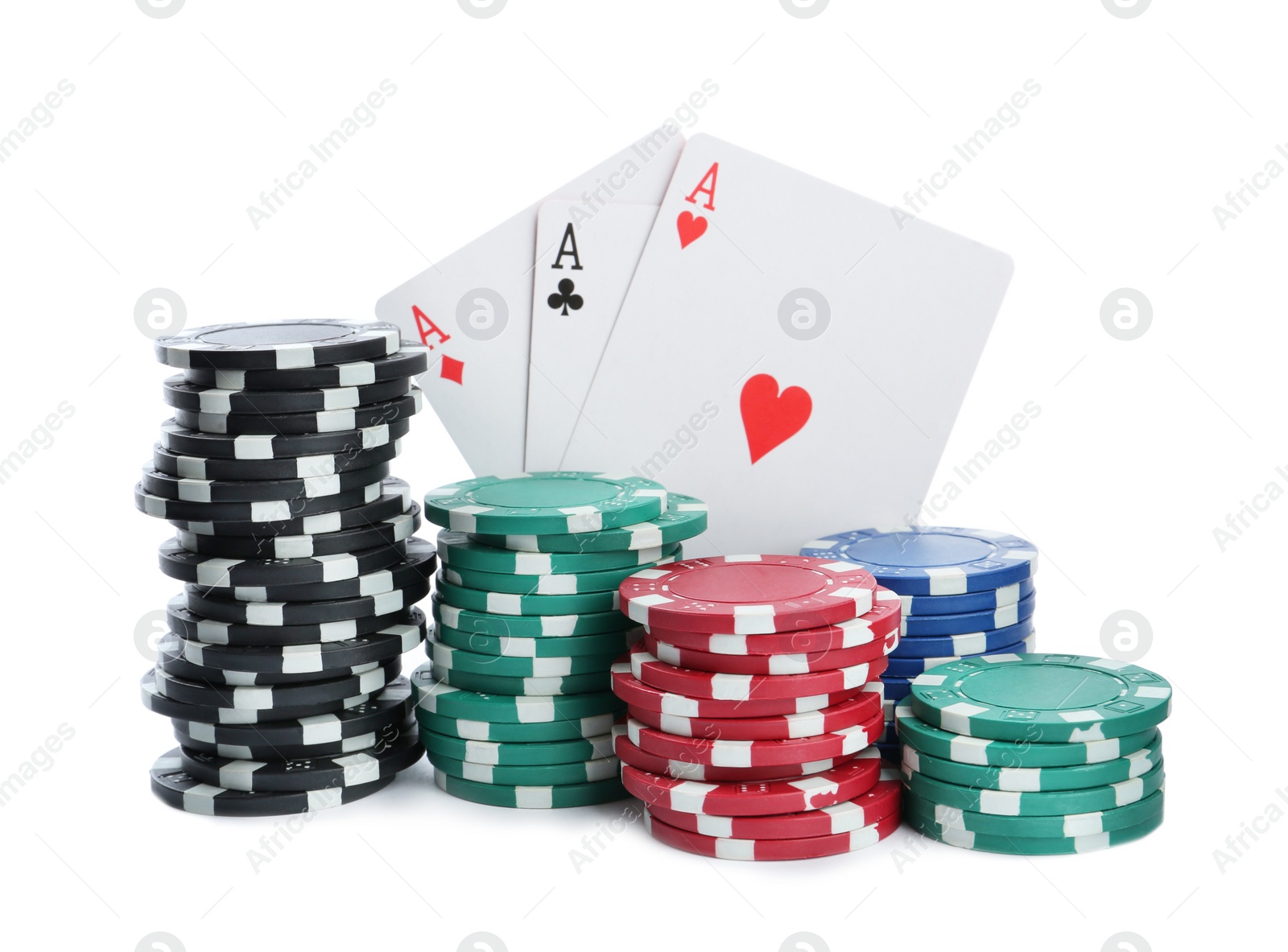 Photo of Playing cards and plastic casino chips on white background. Poker game