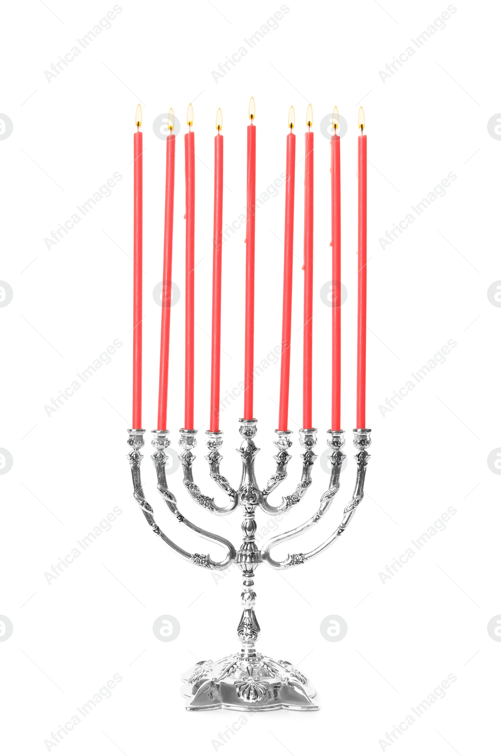 Photo of Silver menorah with burning candles on white background. Hanukkah celebration