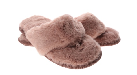 Pair of stylish soft slippers on white background