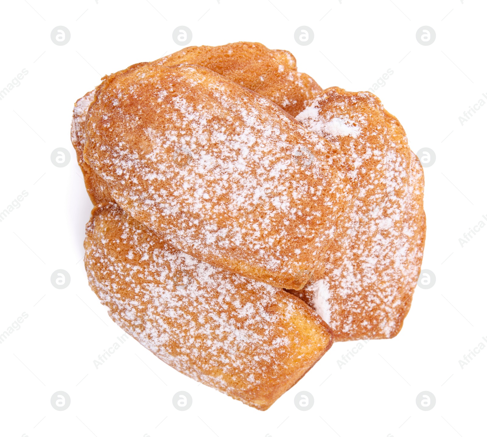 Photo of Delicious madeleine cakes with powdered sugar on white background, top view