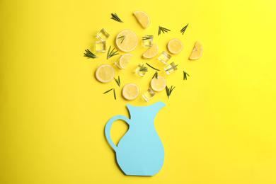Photo of Creative lemonade layout with lemon slices, rosemary and ice on yellow background, top view