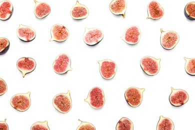 Photo of Cut ripe figs on white background, top view