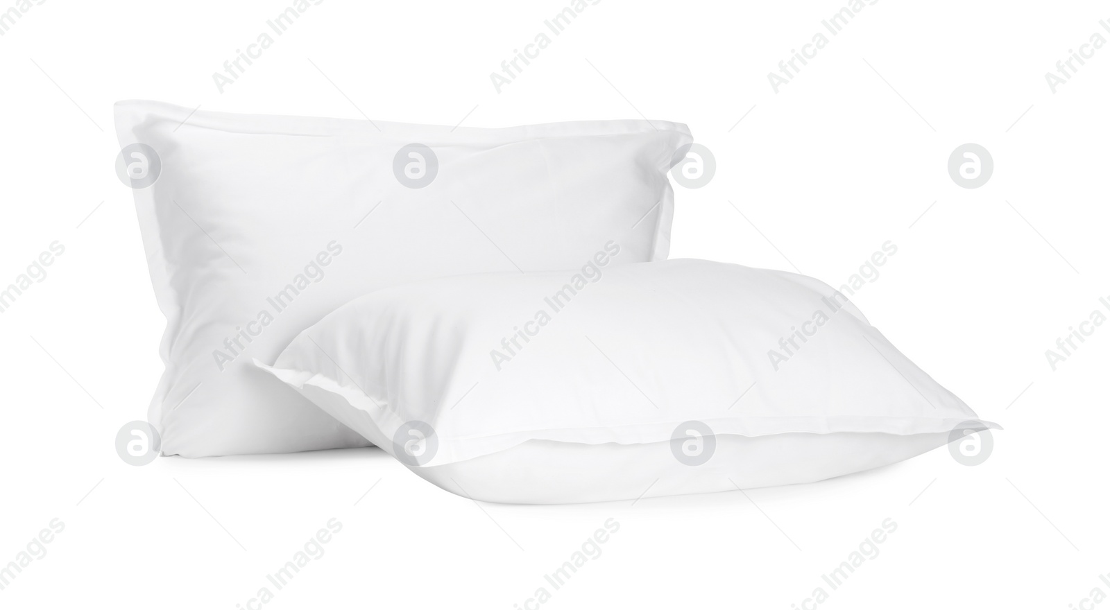 Photo of Two new soft pillows isolated on white