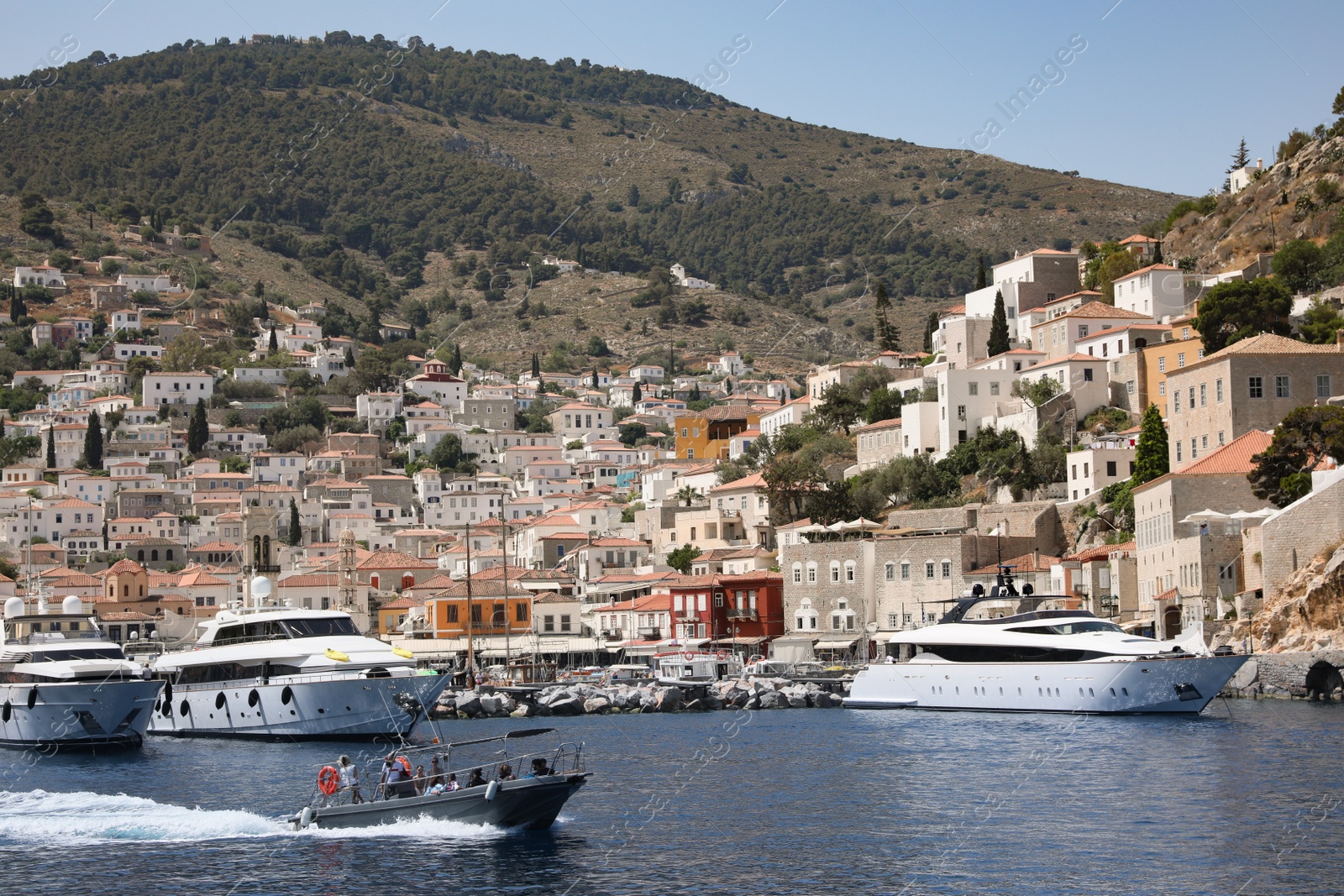 Photo of Beautiful view of sea with boats and coastal city