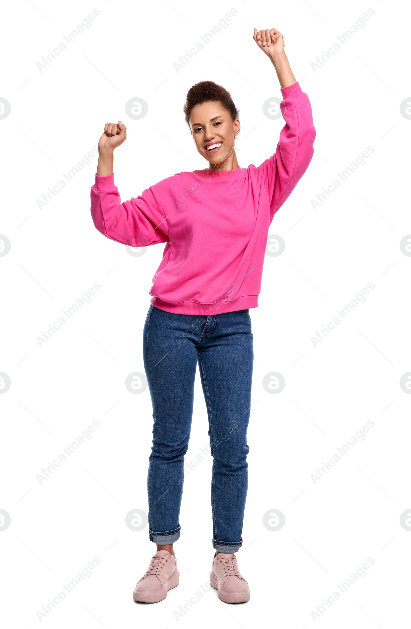 Photo of Happy young woman dancing on white background