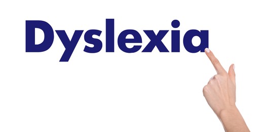 Woman pointing at word Dyslexia on white background, closeup. Banner design