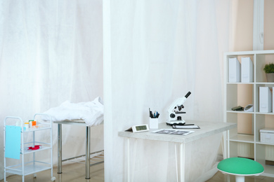 Modern interior of doctor's office with couch