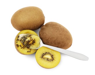 Photo of Fresh ripe yellow kiwis with spoon on white background, top view