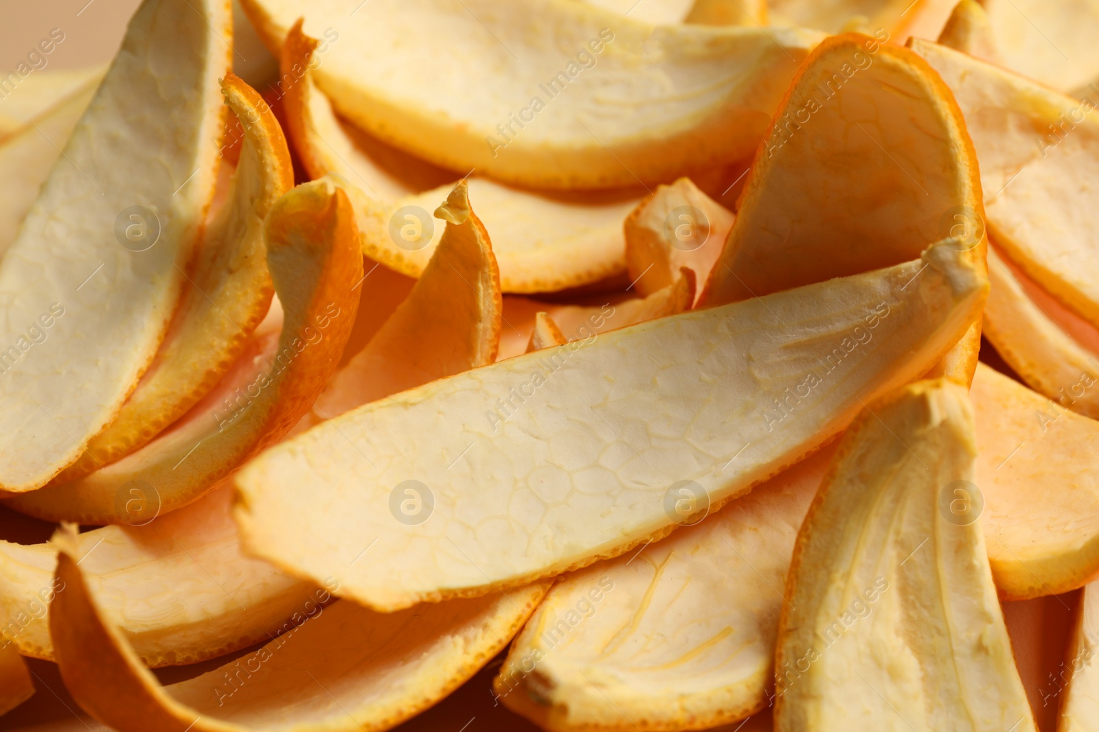 Photo of Many orange peels preparing for drying as background, closeup