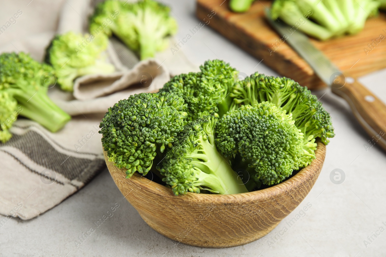 Photo of Fresh green broccoli on light table. Organic food