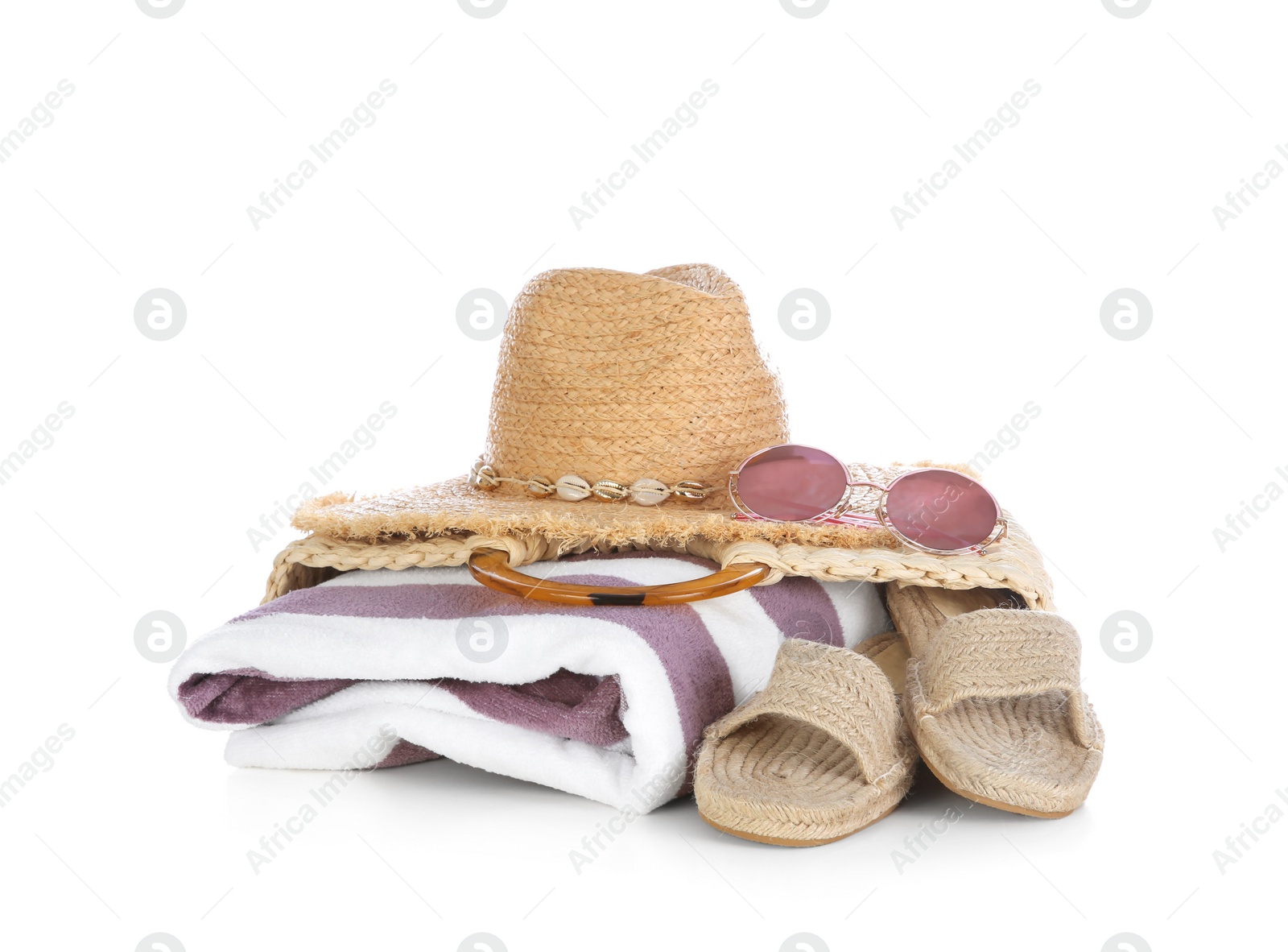 Photo of Different stylish beach accessories on white background