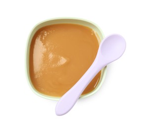 Tasty baby food in bowl and spoon isolated on white, top view