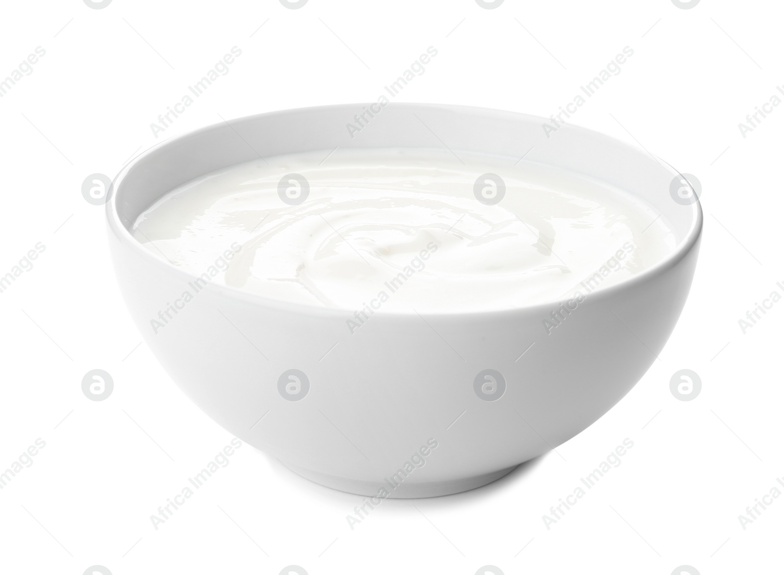 Photo of Bowl with yummy yogurt on white background