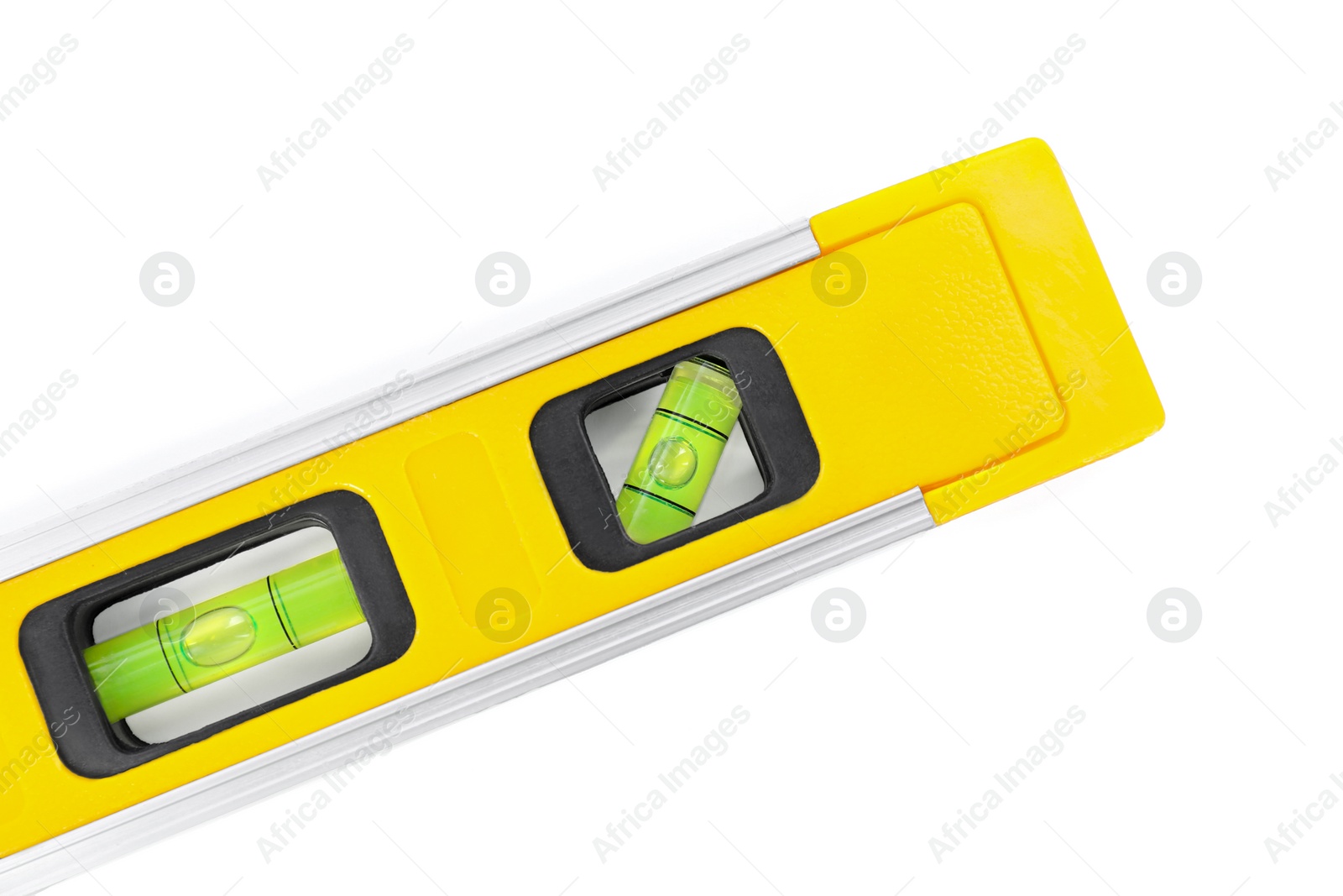 Photo of Yellow building level isolated on white, top view. Construction tool