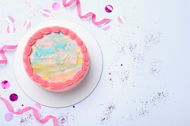 Photo of Cute bento cake with tasty cream and decor on white background, top view