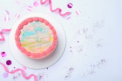 Cute bento cake with tasty cream and decor on white background, top view