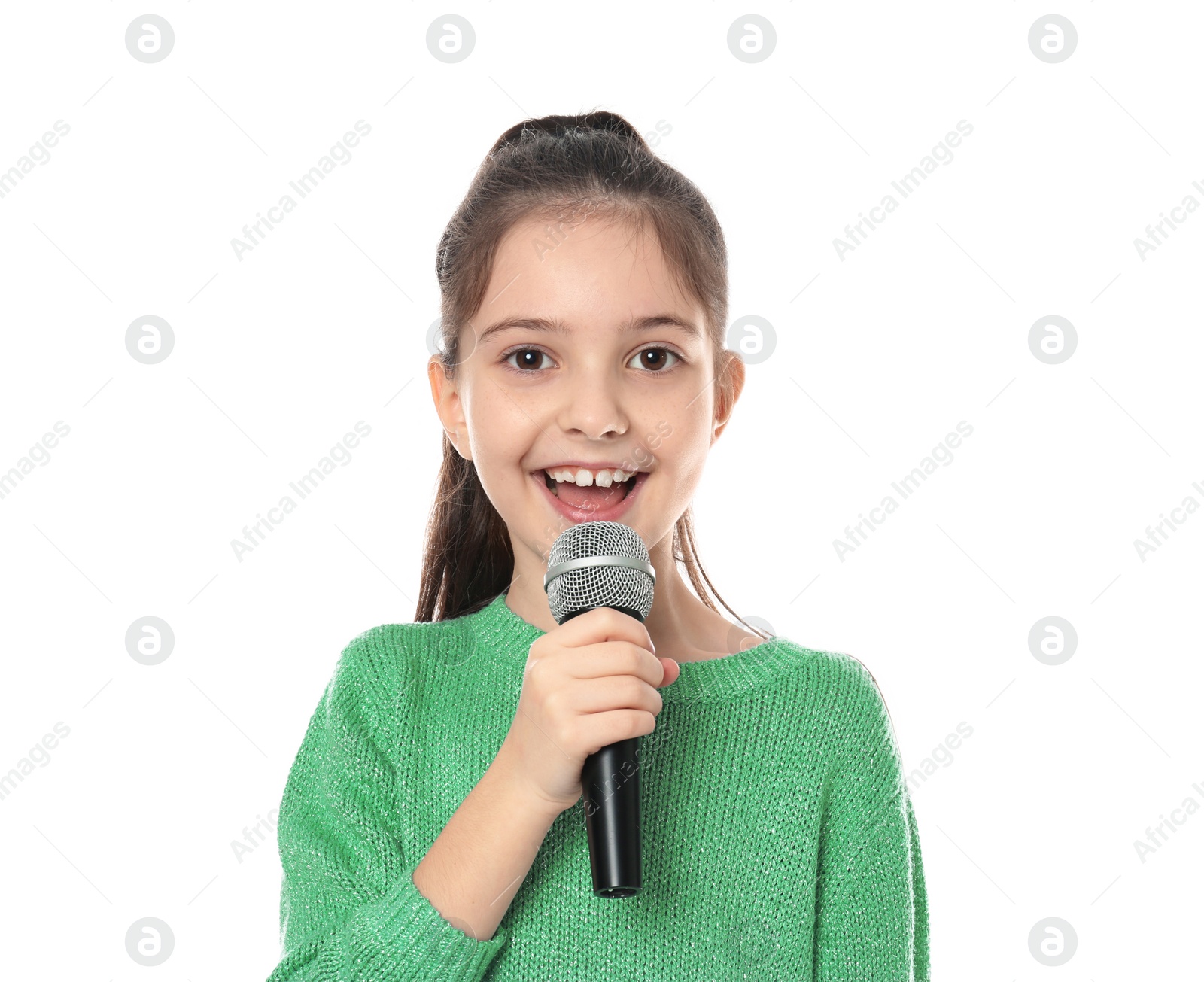 Photo of Little girl singing into microphone on white background