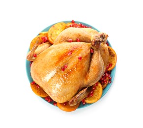 Photo of Roasted chicken with oranges and pomegranate isolated on white, top view